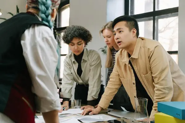 AI Marketing Analytics: Unlocking it's Potential 3 man discussed a plan
