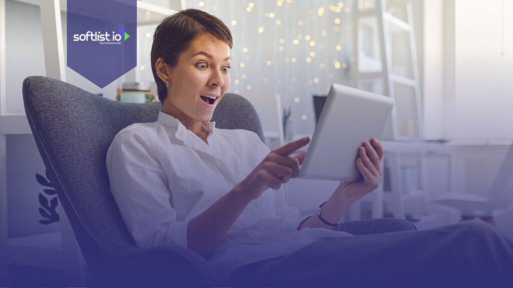 Surprised lady using her tablet.